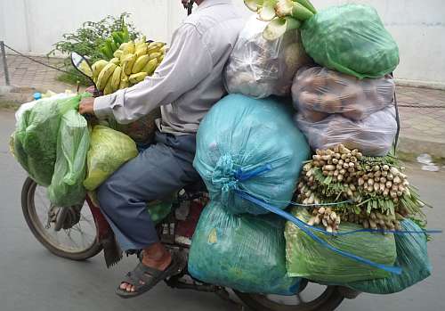 Motorcycle loaded with vegetables